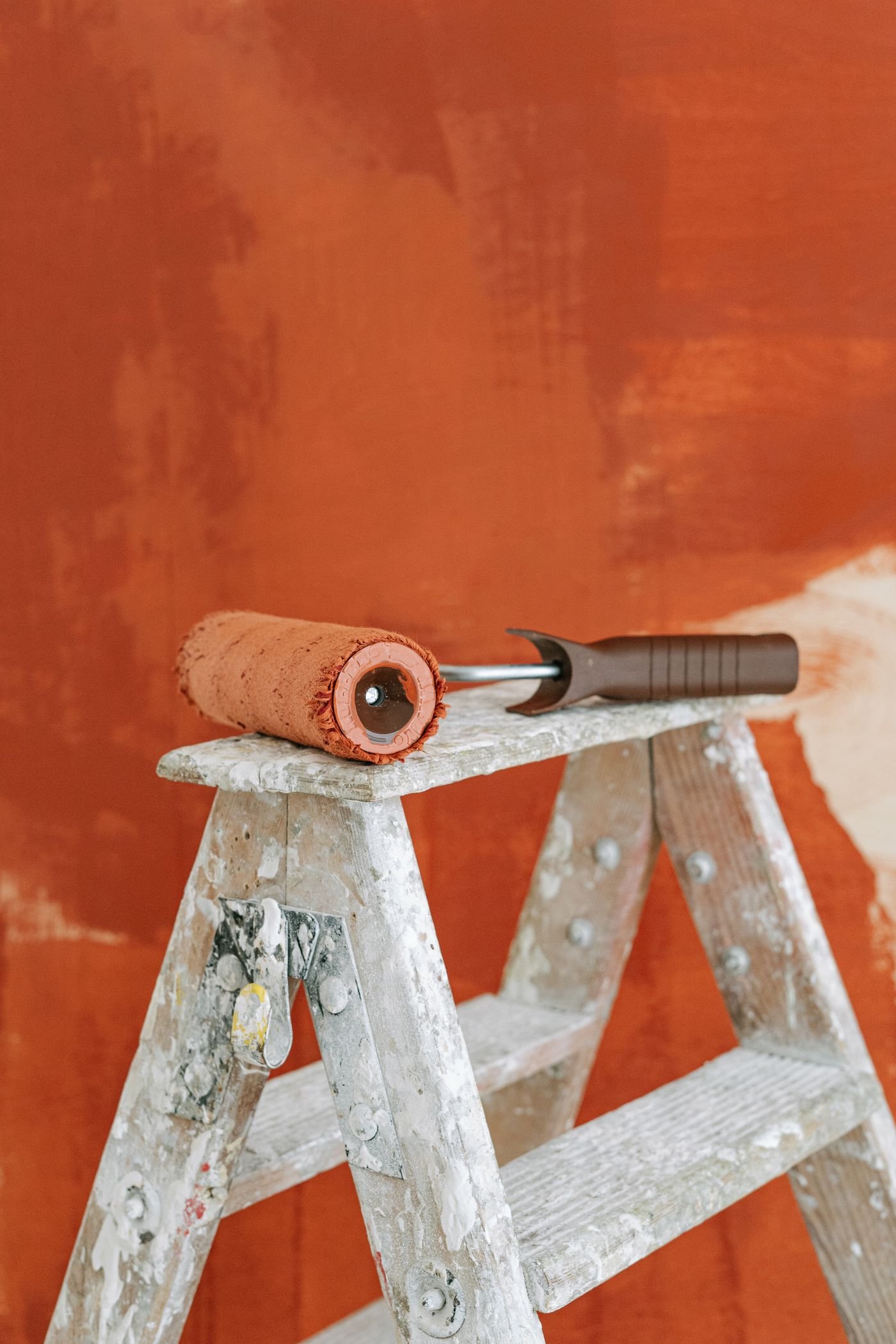 Orange feature wall with roller